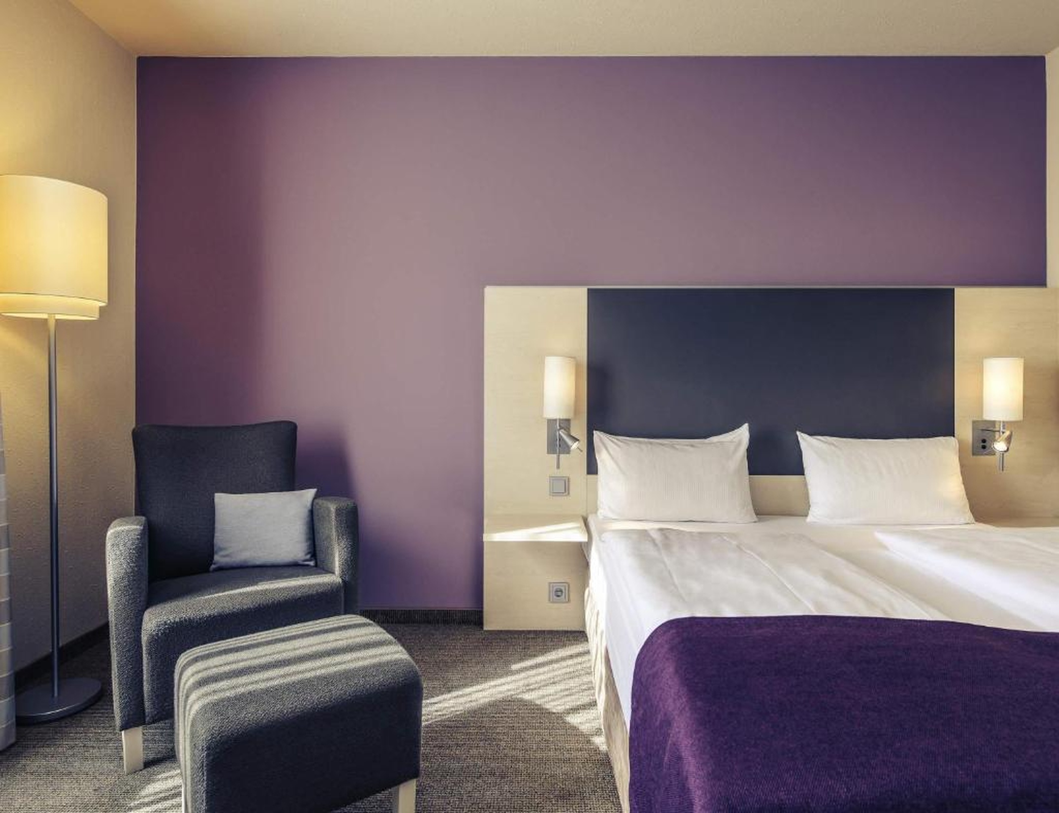 Standard Room with queen-size bed and sofa